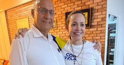 Williams Dávila Barrios com Corina Machado, líder da oposição.